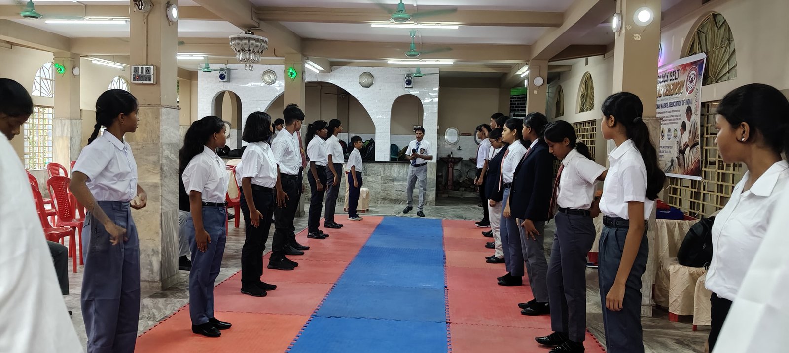 Students practicing at the federation karate referee and judge practice seminar